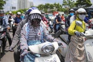 Urban Vietnamese covering their skin